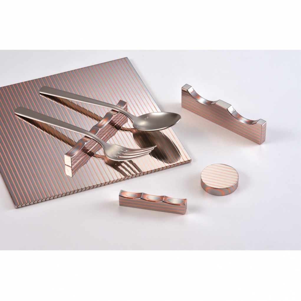 Clad steel cutlery rest